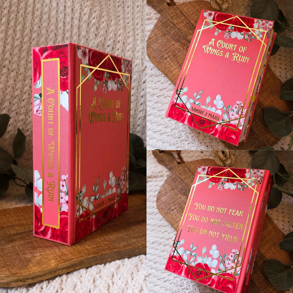 Collage of 'A Court of Wings & Ruin' book with decorative cover on a wooden surface.